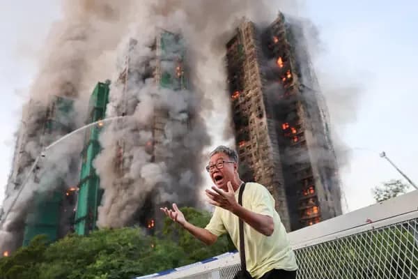 Fire Tears Through Hong Kong High-Rises, Killing 13 and Leaving Hundreds Displaced