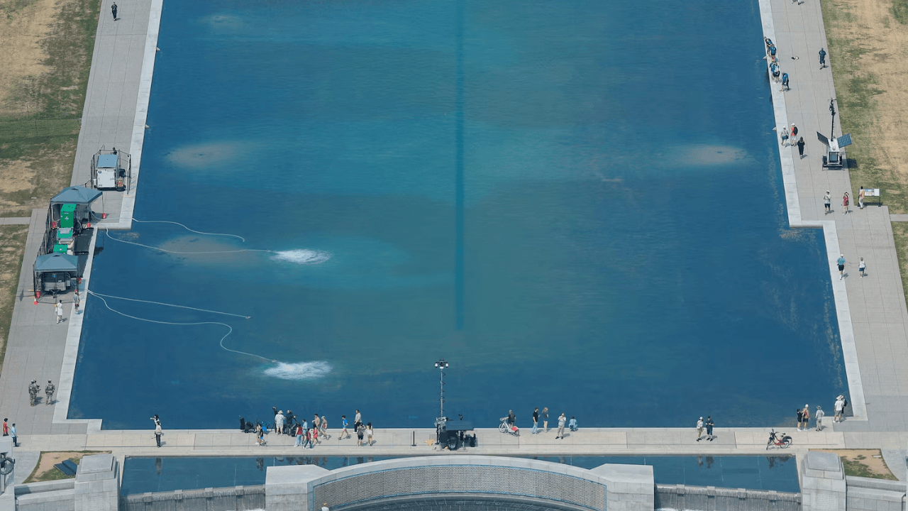 Reflecting Pool Repairs Continue as Trump Blames Vandals Without Evidence