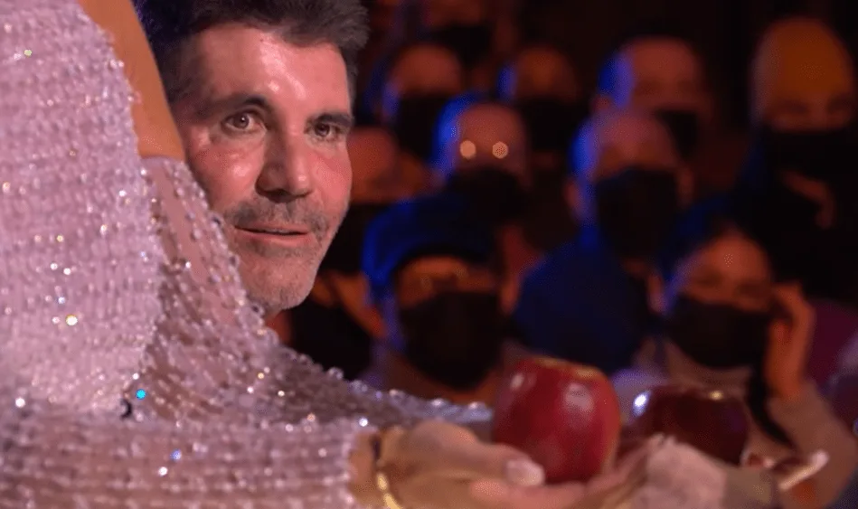 Simon Cowell said to choose the Apple on Amanda's left hand which means the Witch's right side. bgt witch apple