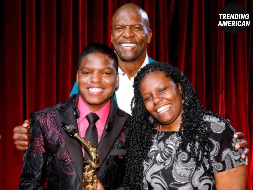 Avery Dixon with his mother and Terry Crews
