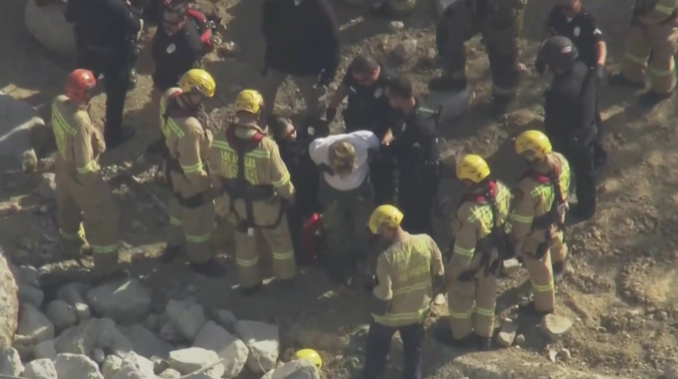 California Woman Rescued from a Hole, Later Arrested